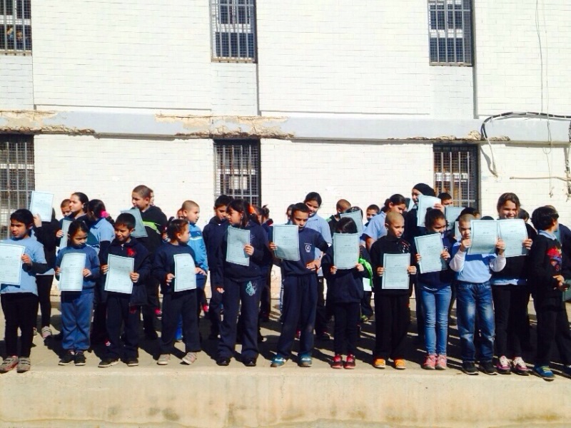 بالصور: توزيع الشهادات على الطلاب في مدرسة الأخوة العربية الابتدائية بيافا